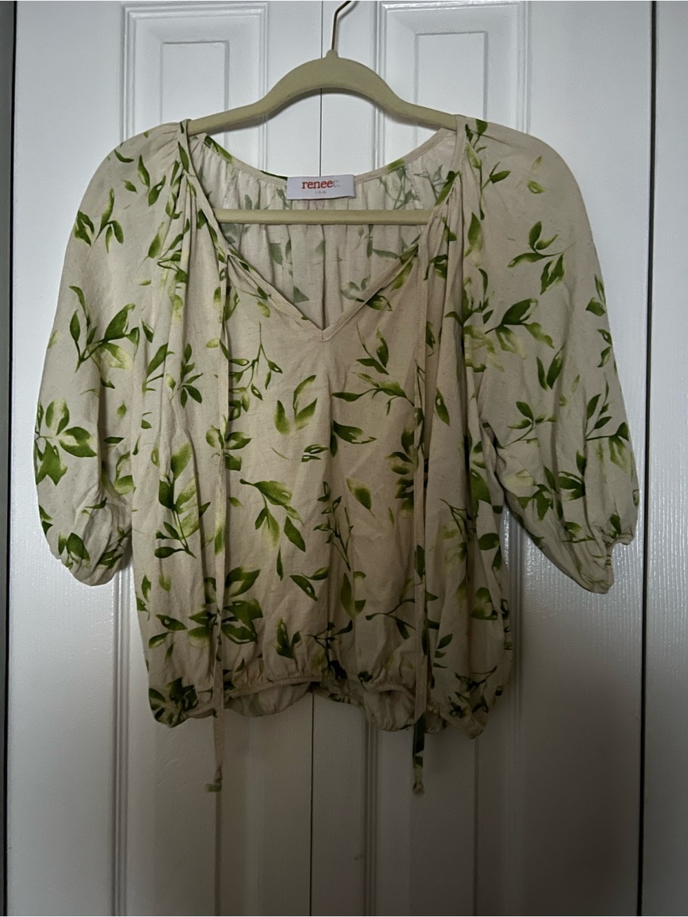 Renee C. Cream Blouse with Green Leaf Print